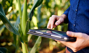 man holding a tablet